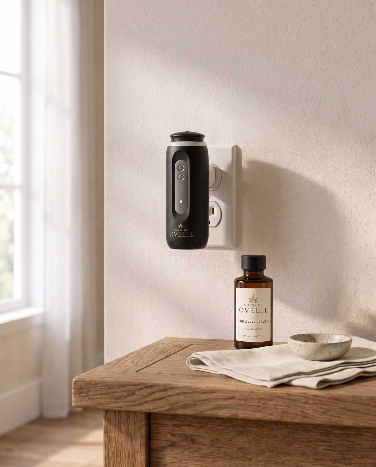 Signature Starter Kit — Ovelle Halo plug-in diffuser with a House of Ovelle fragrance oil